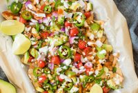 Sheet Pan Chicken Nachos with Melted Cheese and Salsa