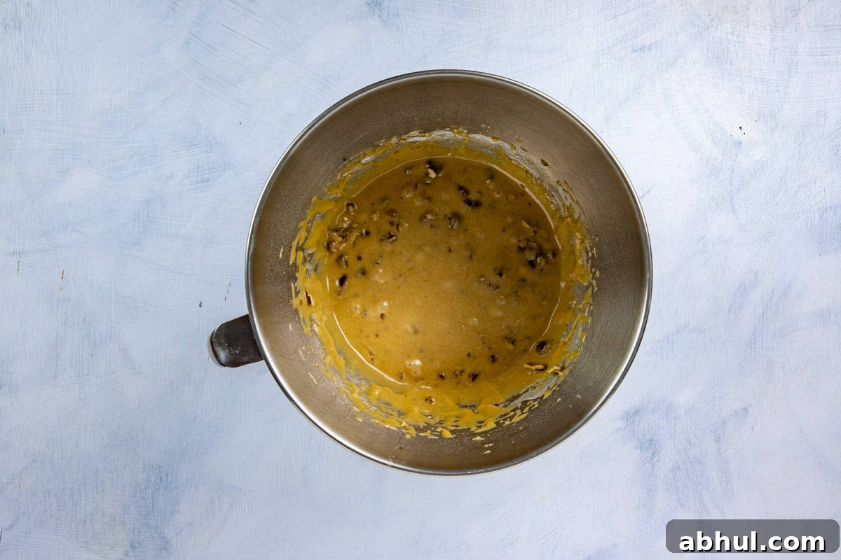 Nuts and chocolate chips added to the butter flour mixture.
