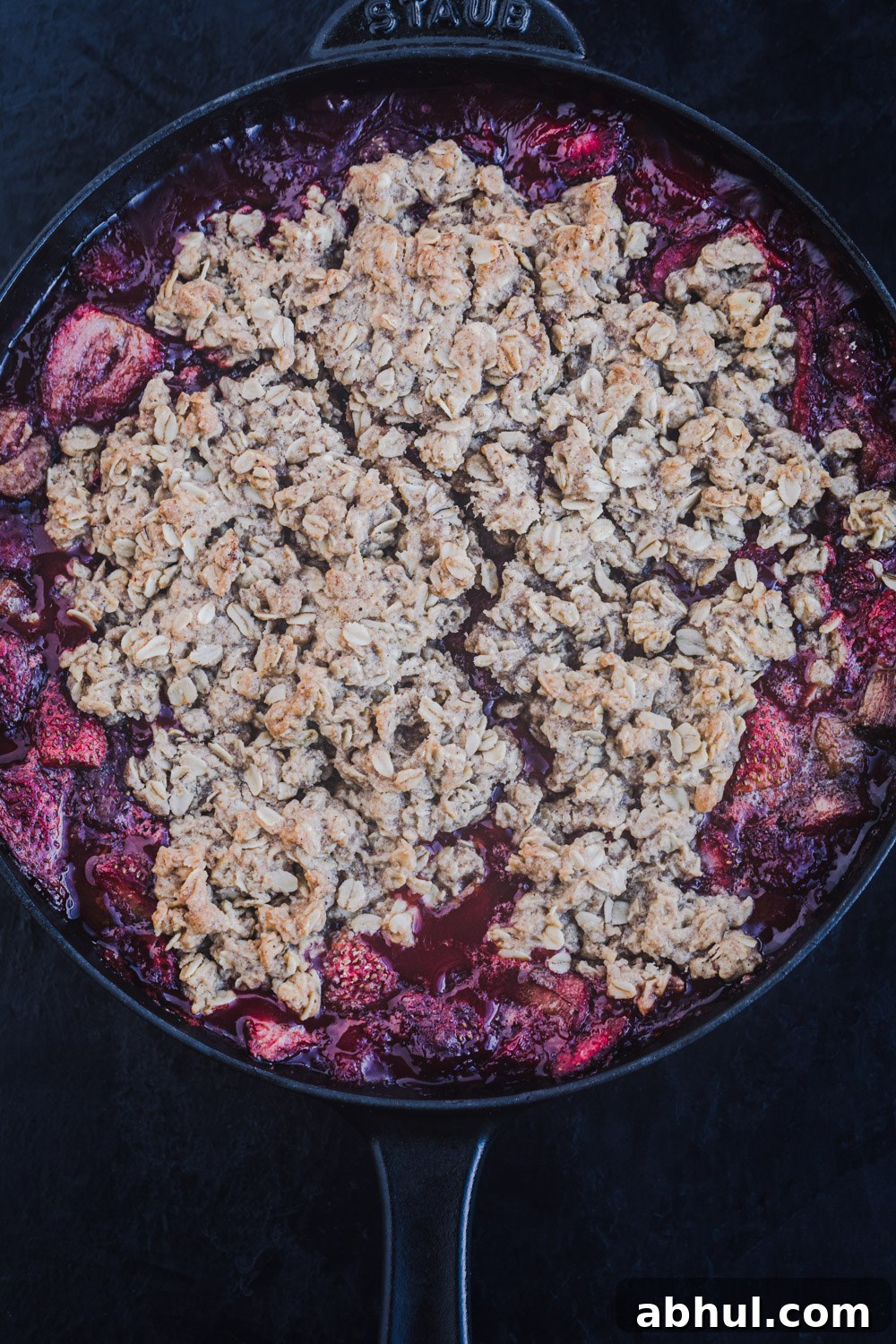 Strawberry-rhubarb crisp, just out of the oven, overhead shot.