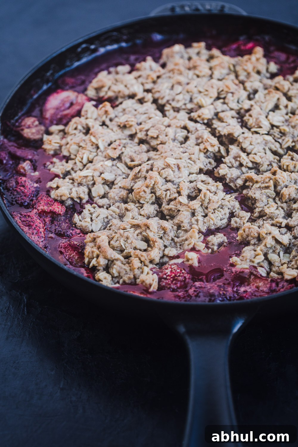 Side angle shot of the strawberry-rhubarb crisp, just out of the oven.