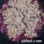 Strawberry-rhubarb crisp, just out of the oven, overhead shot.