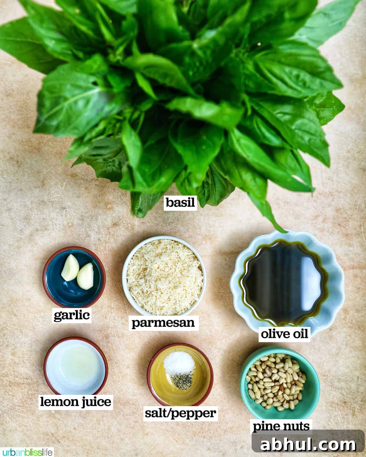 bowls of ingredients to make pesto.