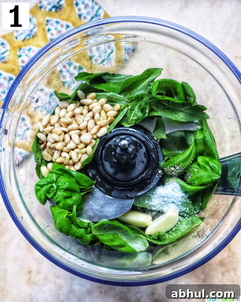 ingredients to make pesto in a food processor.