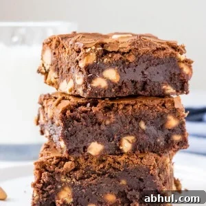 Fudgy, gooey peanut butter brownies have a delicious chocolate peanut butter flavor and are filled with peanut butter chips.
