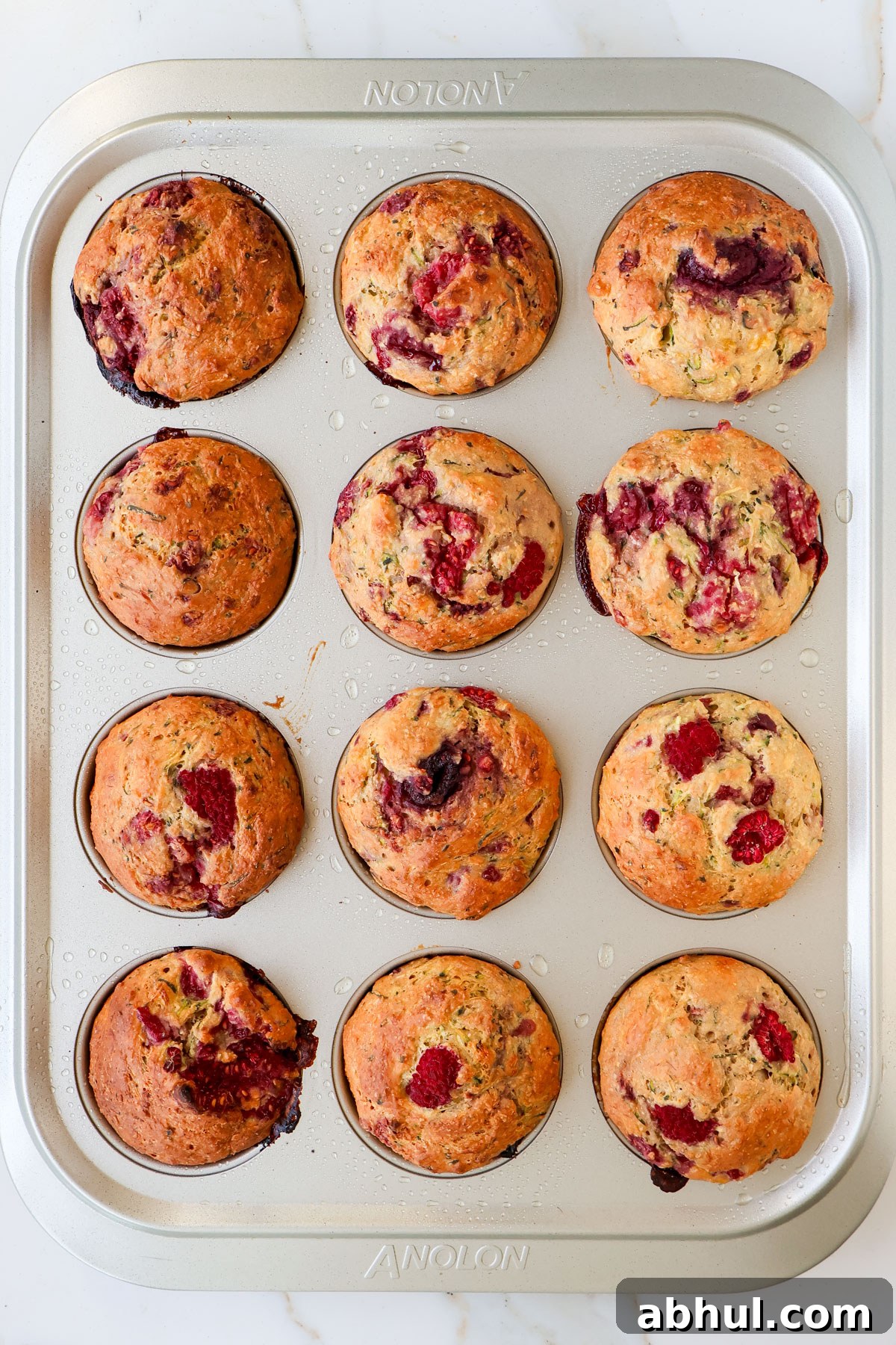Baked muffins in pan.