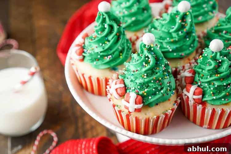Piped Christmas tree frosting on cupcakes