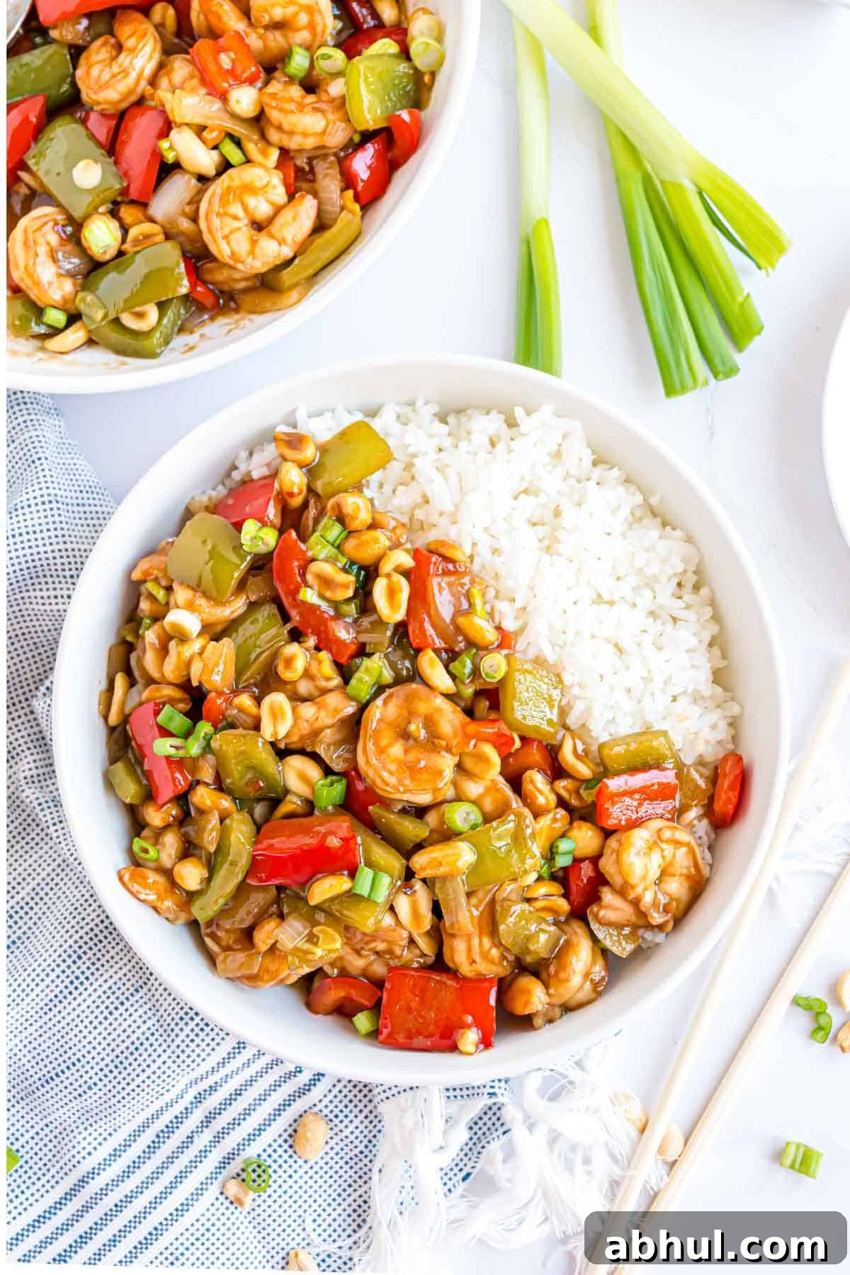Overehead view of Kung Pao shrimp, served with jasmine rice.