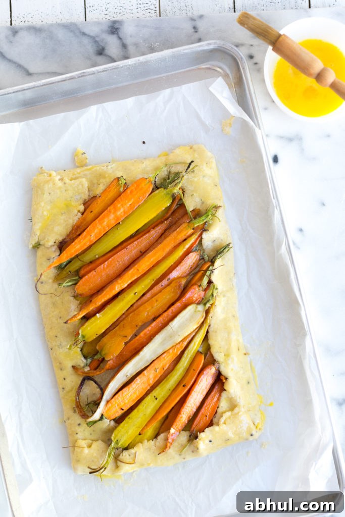 Forming savory Carrot & Feta Galette 