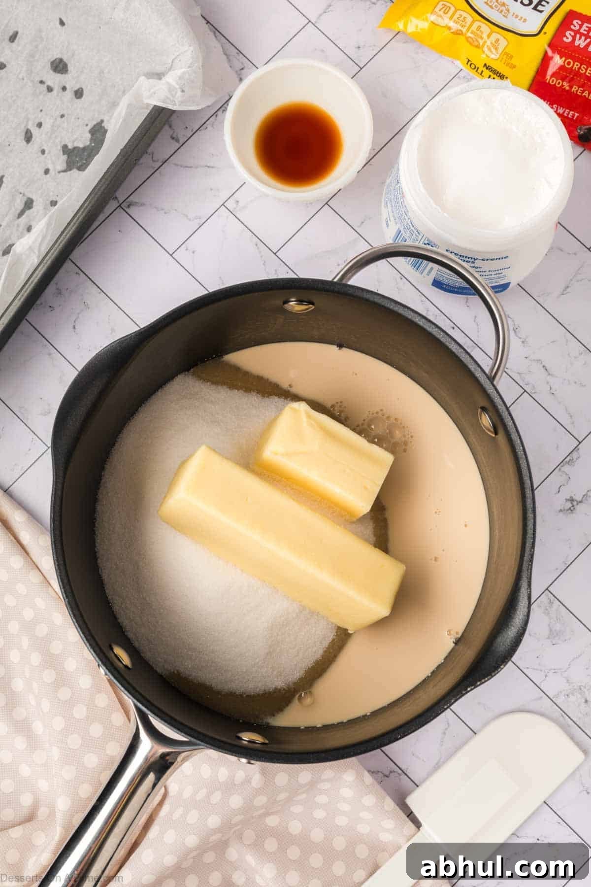 Butter, sugar and sweetened condensed milk in a pan. 