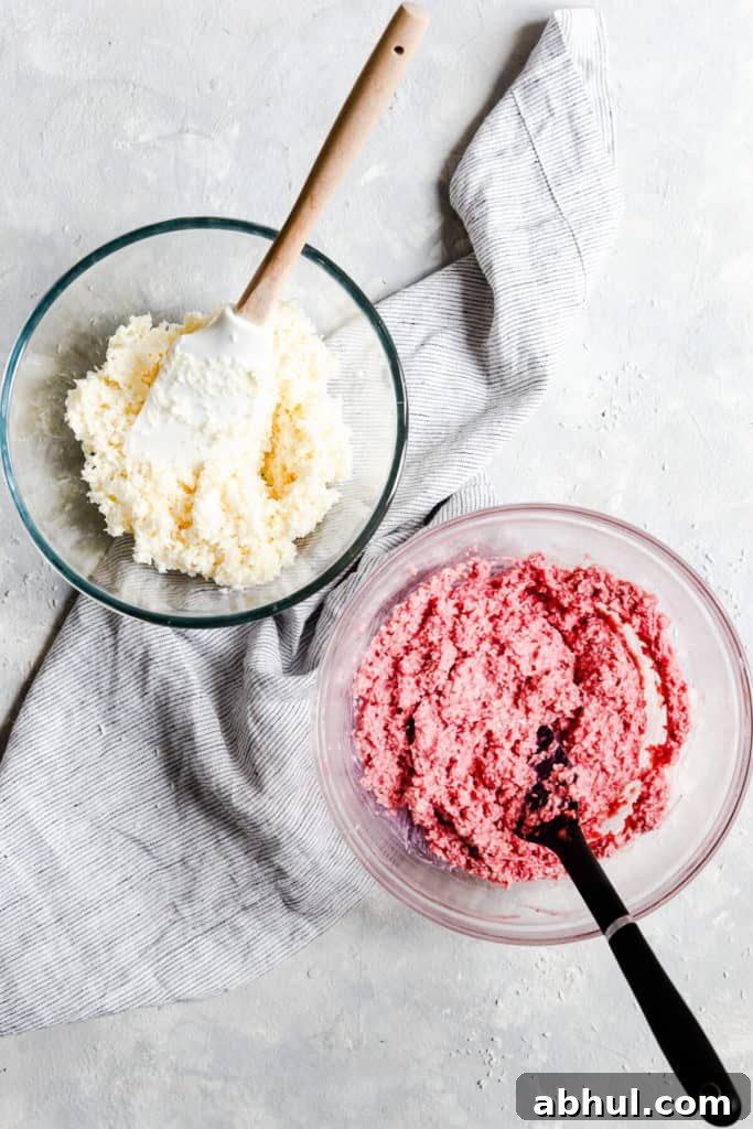Strawberry Coconut Frozen Squares: Refreshing No-Bake Treat 13 top view of two bowls with different colours of coconut mixture