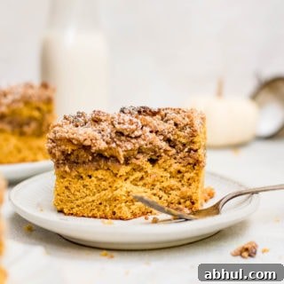 pumpkin coffee cake with piece of cake missing