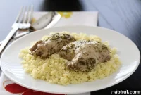 Pesto Chicken Thighs in Italian Cream Sauce over Parmesan Couscous