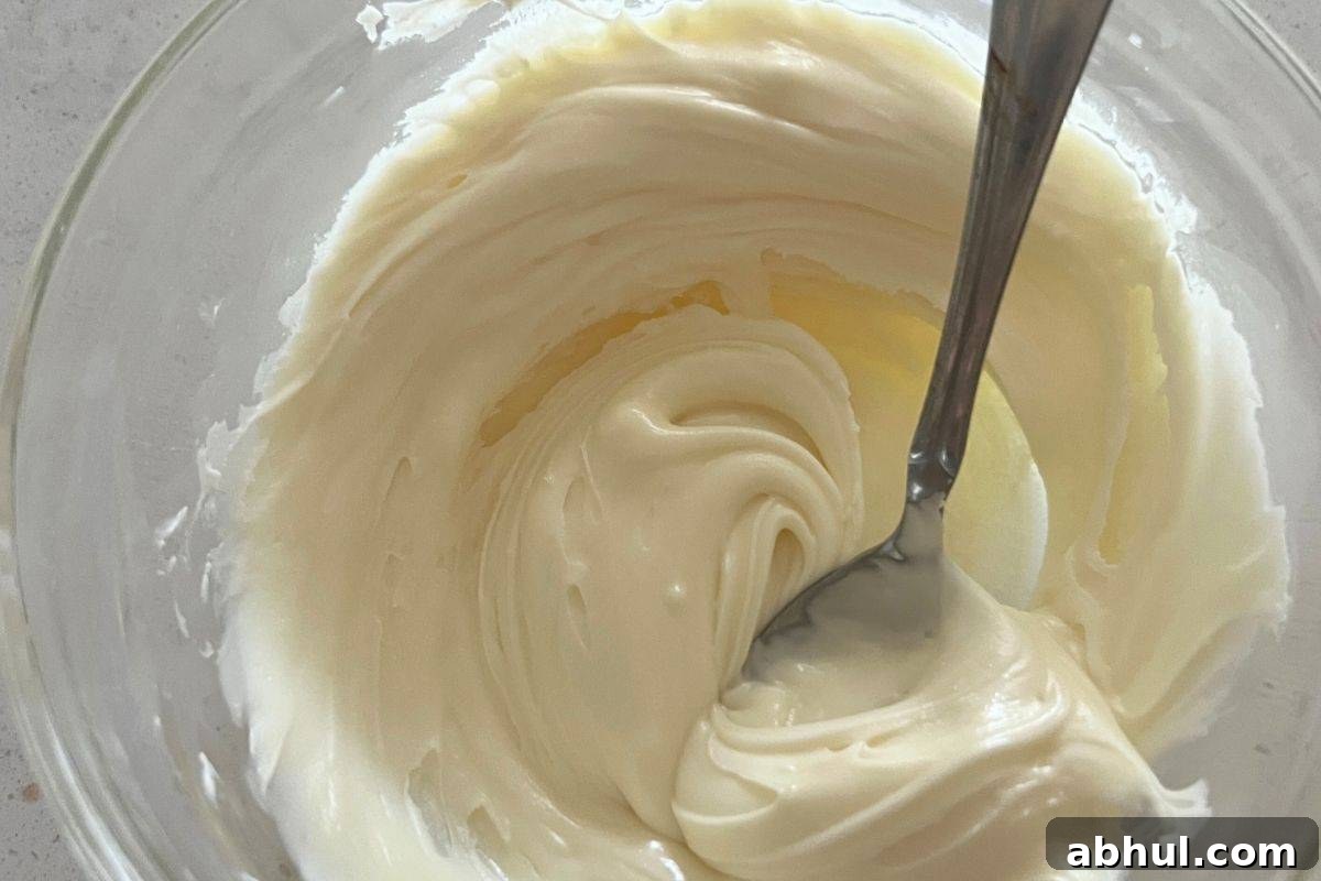 Melted white chocolate in a bowl