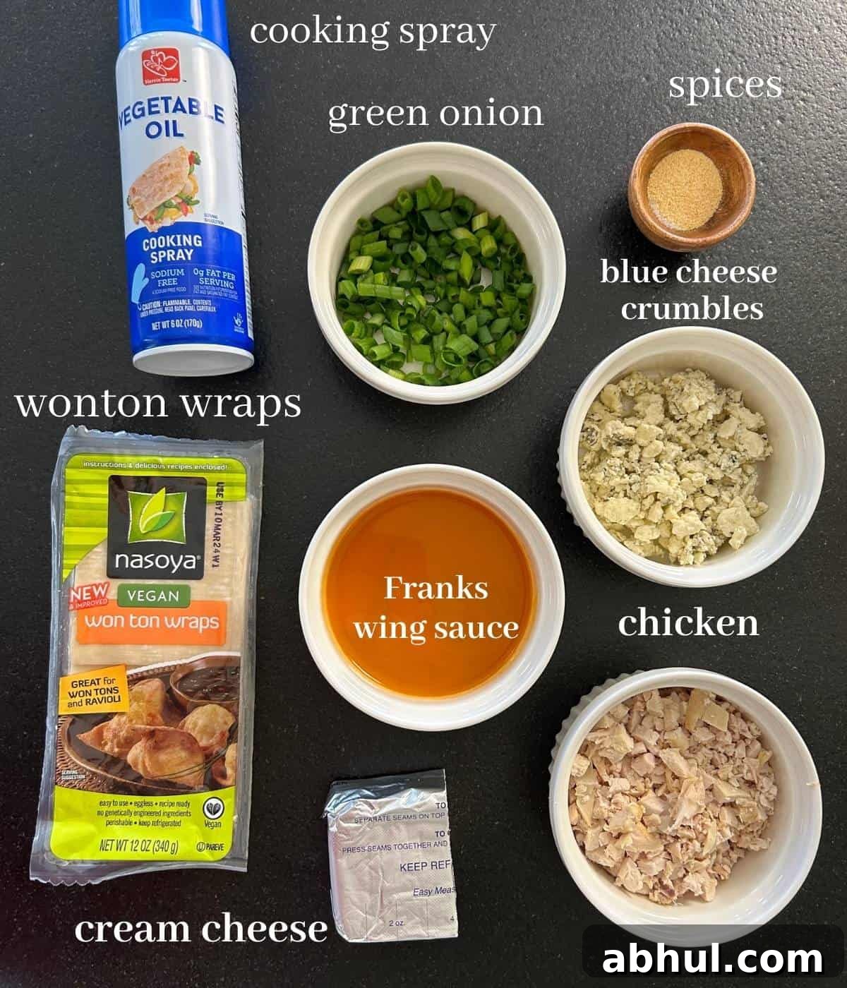 Ingredients for buffalo chicken wonton cups on counter.