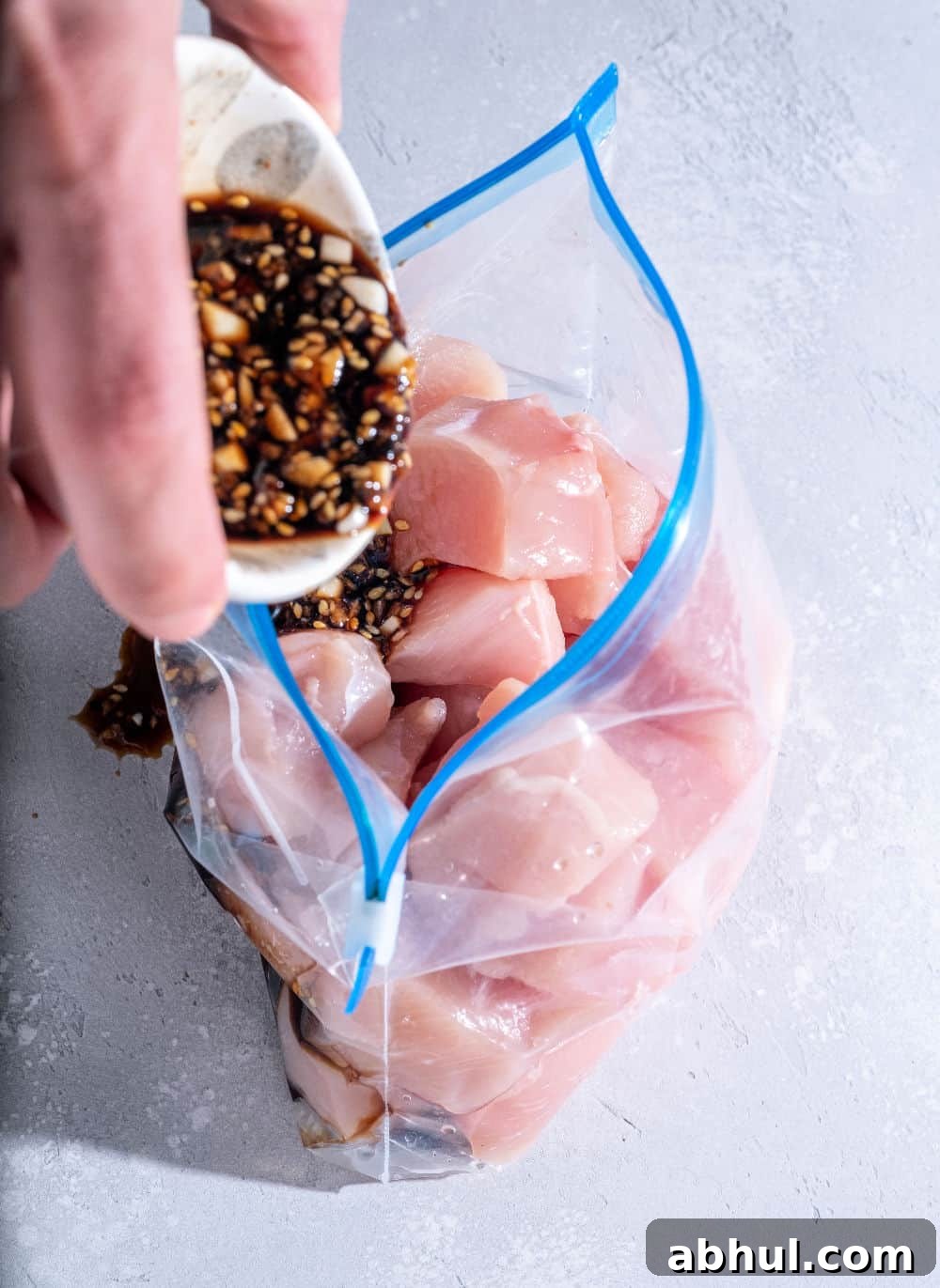 15 Smart Tips for Meal Prep and Freezer-Friendly Recipes 2 freezer meal prep with sauce and raw chicken