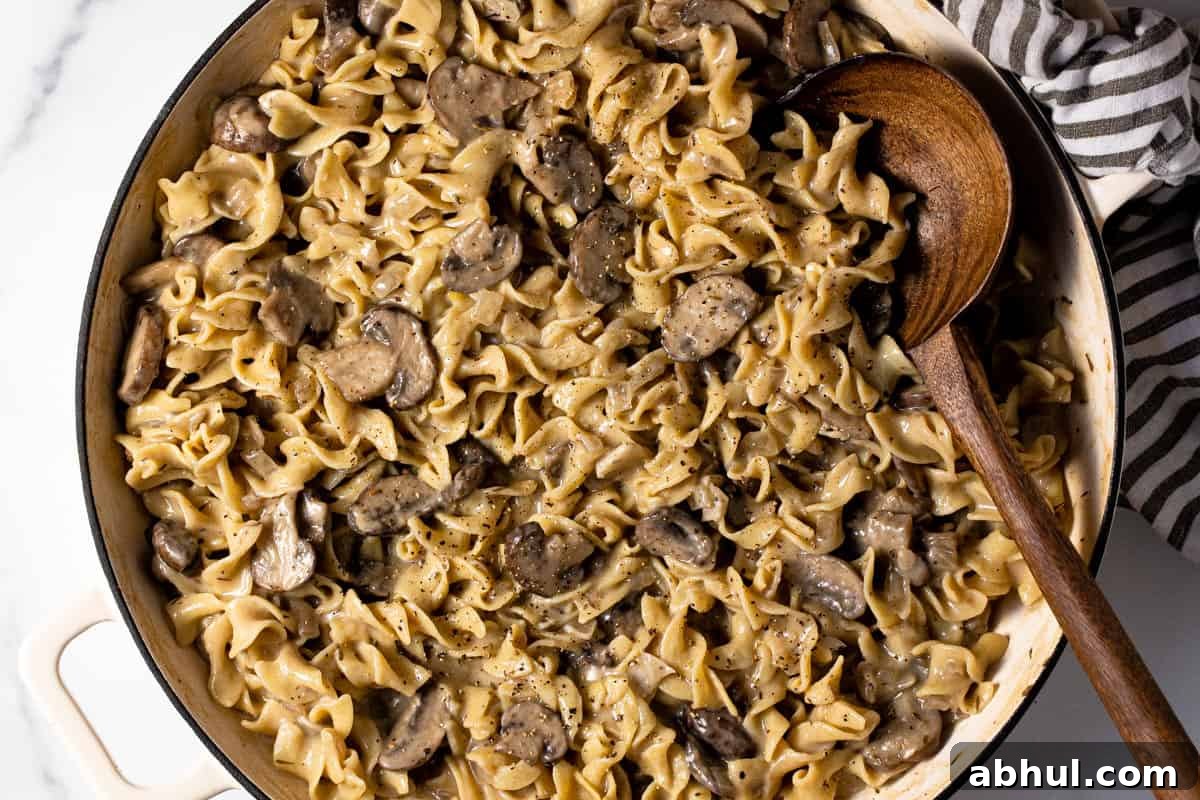 Large sauté pan filled with one pot mushroom stroganoff 
