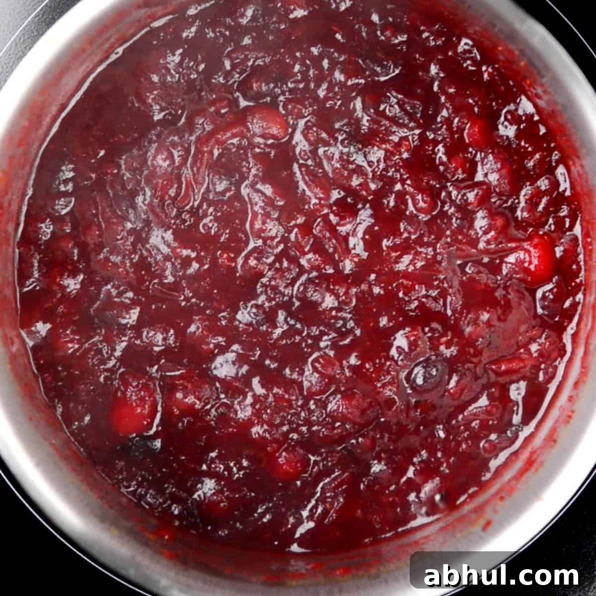 cranberry sauce cooking on stove