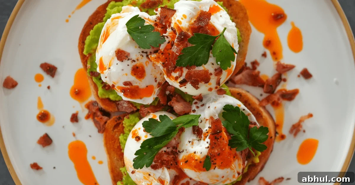 Creamy Avocado Toast Topped with Perfect Poached Eggs 2 This indulgent avocado toast is layered with creamy smashed avocado, perfectly poached eggs, and crispy bacon, all finished with a drizzle of homemade chilli oil. It’s a quick, café-style breakfast that’s rich in flavour, easy to prepare, and ready in under 20 minute