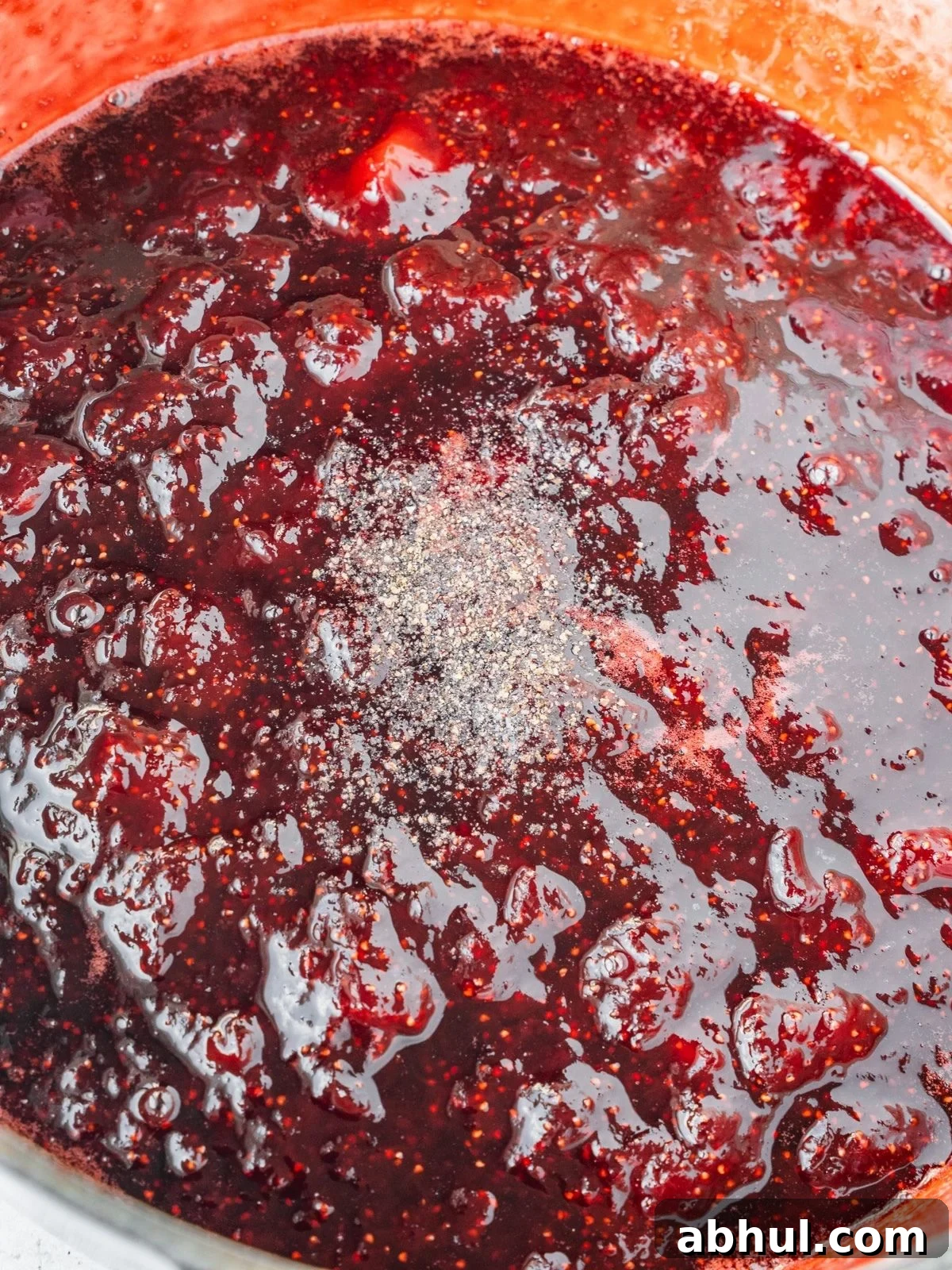 Strawberry-Balsamic Jam with Black Pepper — Homemade Recipe 10 Adding the black pepper and balsamic vinegar to the cooked jam.