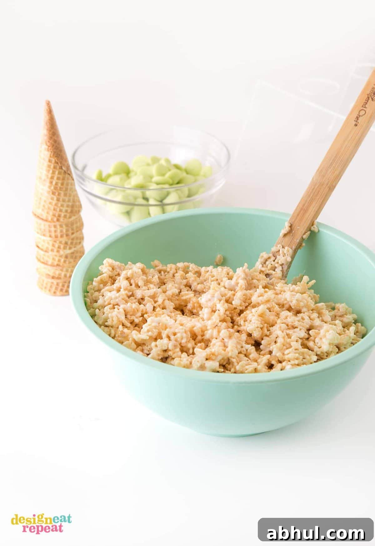 Mixing Rice Krispie cereal treats in a bowl