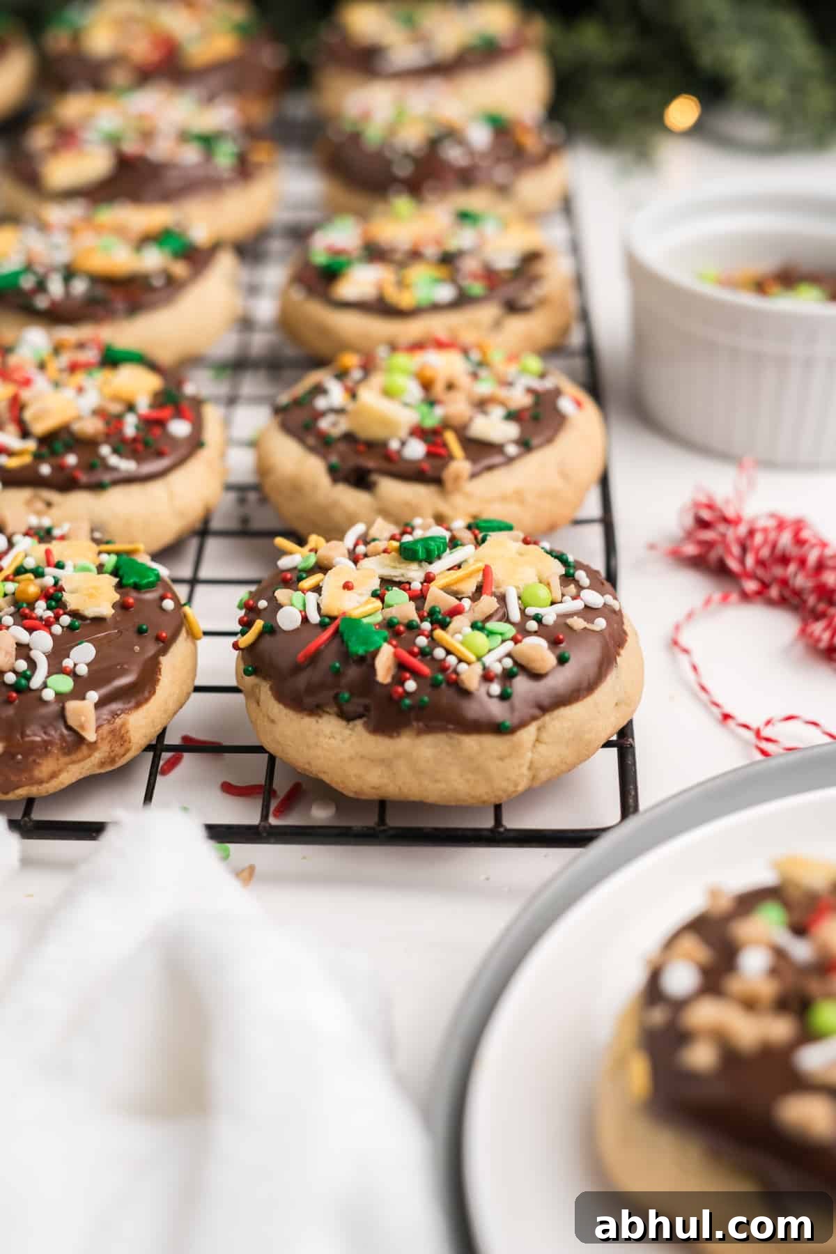 Christmas Crack Cookies Recipe: Salty-Sweet Holiday Crackers 15 Christmas crack cookies on a cooling rack.