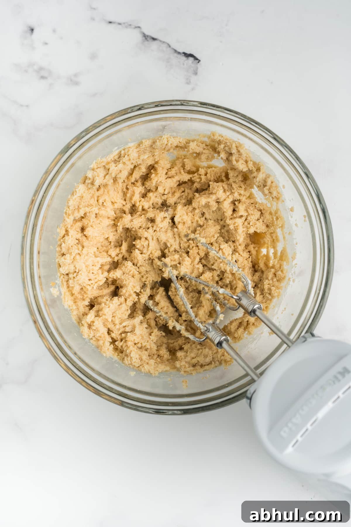 Christmas Crack Cookies Recipe: Salty-Sweet Holiday Crackers 5 Butter and sugar creamed together in a bowl.
