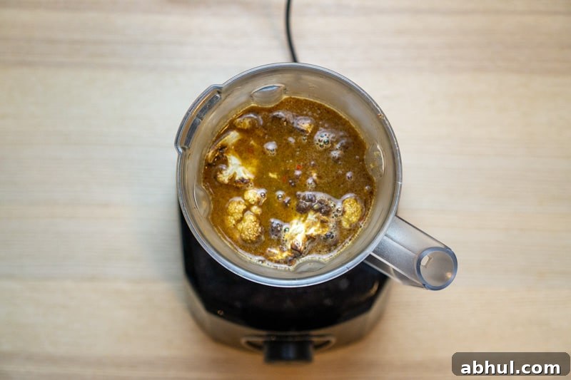 Cream-Free Vegan Roasted Cauliflower Soup Recipe 7 Pureeing the soup
