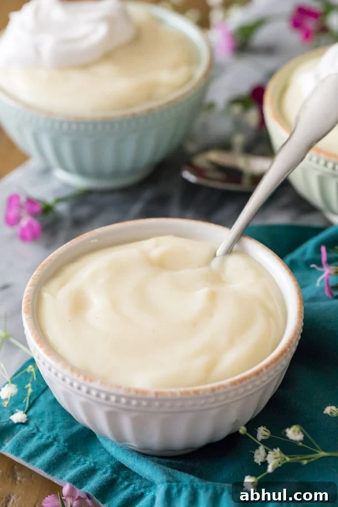 Homemade vanilla pudding in white bowl