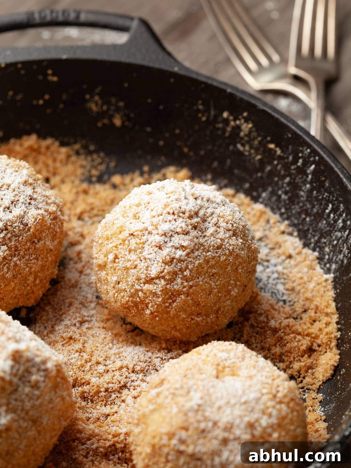 Gluten Free Marillenknödel (Austrian Apricot Dumplings) in a cast iron pan