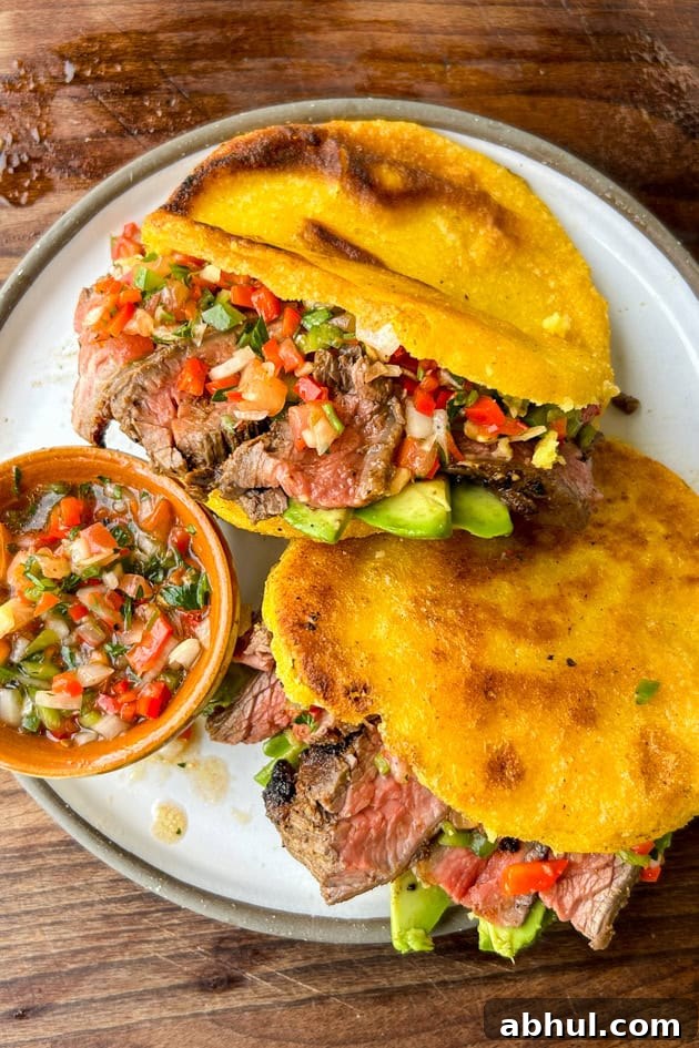 Mojo Steak Arepas with Salsa Criolla