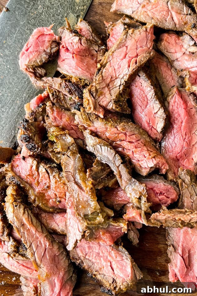 sliced mojo steak cooked medium-rare