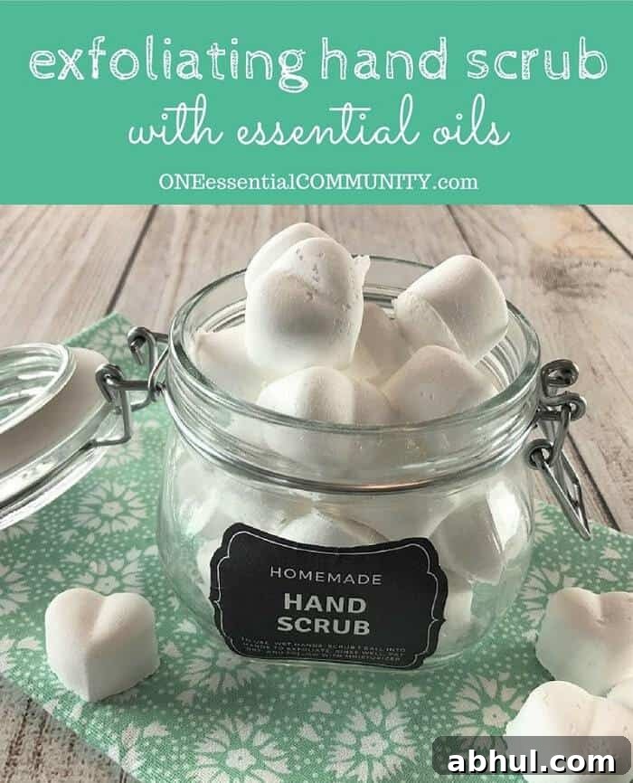 Easy homemade hand scrub recipe with essential oils to exfoliate dry skin. All natural, inexpensive, & easy to make. Adorable labels. Made with Epsom salt, baking soda, and lemon and lavender essential oil.
