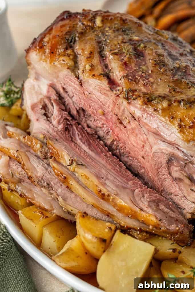 Carving the roast lamb.