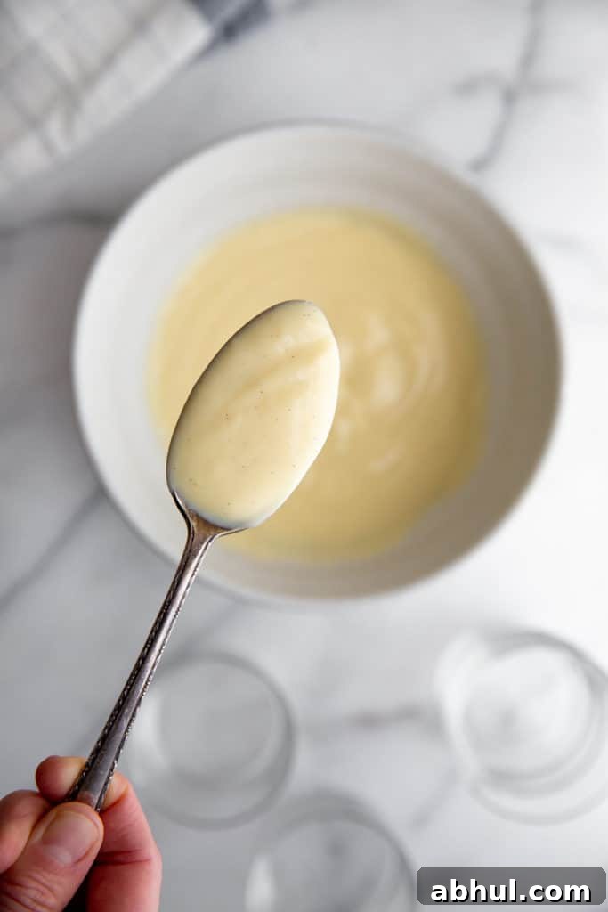Homemade Gluten-Free Vanilla Pudding Recipe from Scratch 3 A spoonful of vanilla pudding from scratch.