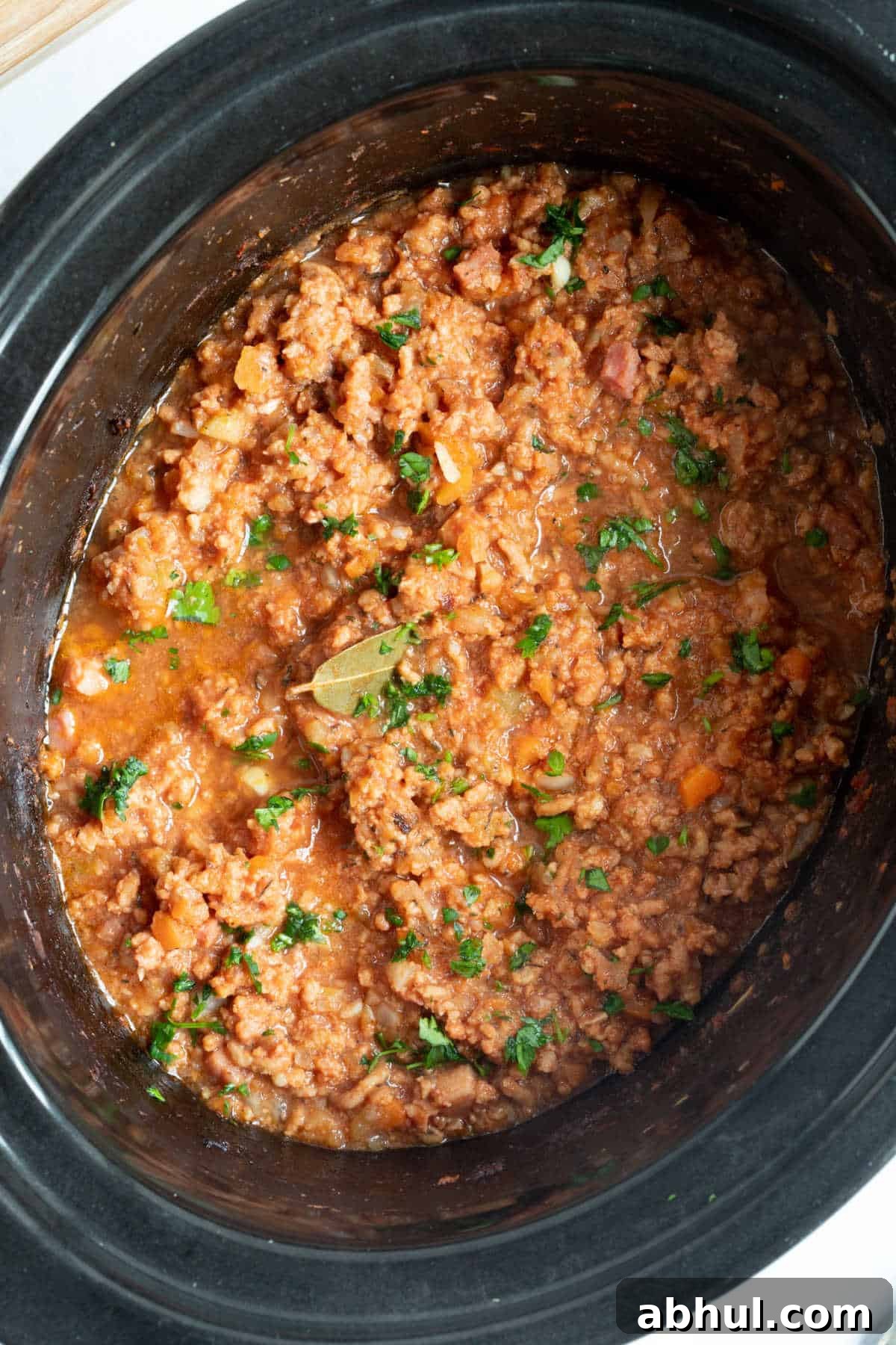Slow Cooker Pork Ragu: Tender Slow-Braised Pork Ragù Recipe 2 Pork ragu in a slow cooker.