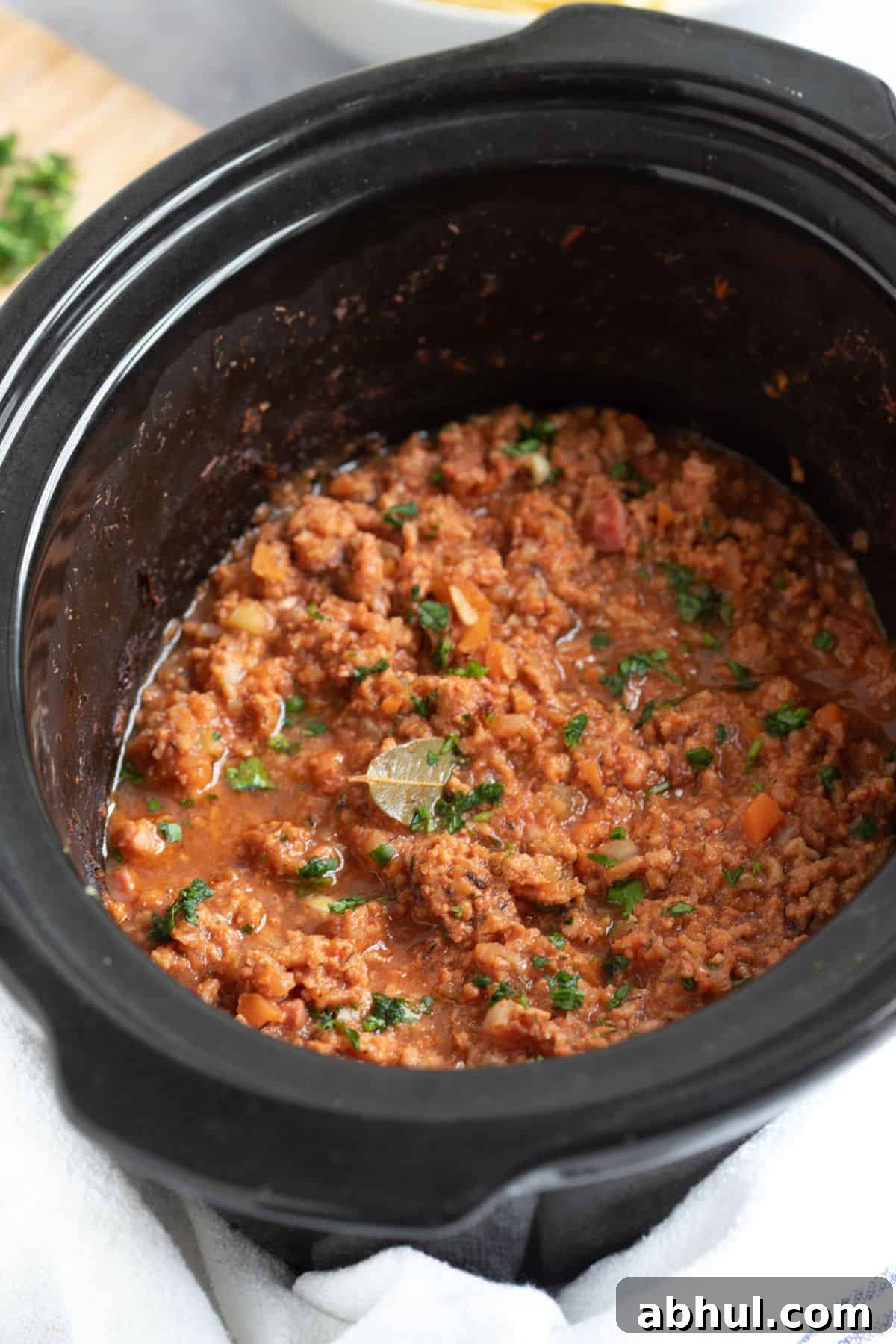 Slow Cooker Pork Ragu: Tender Slow-Braised Pork Ragù Recipe 5 Slow cooker pork mince ragu in a slow cooker.