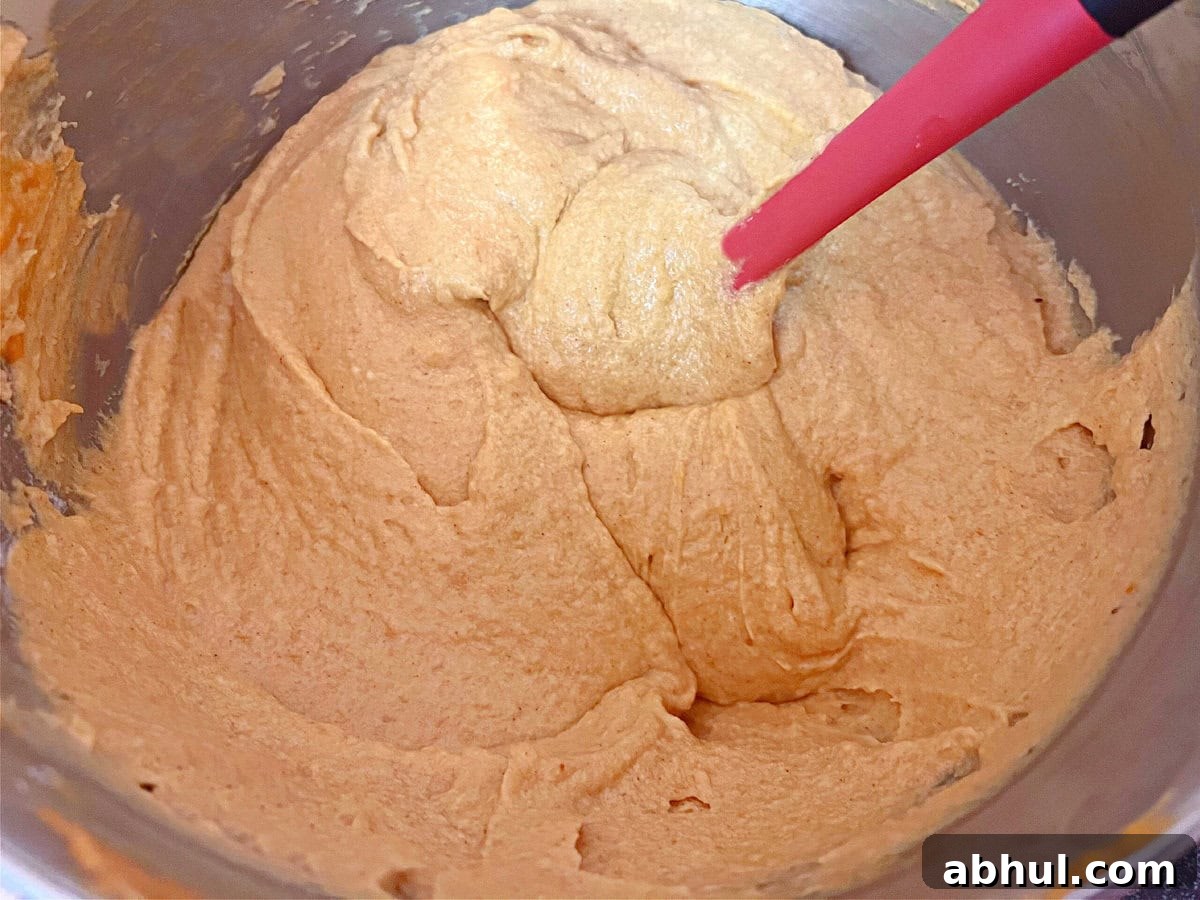 Pumpkin Snickerdoodle Bundt Cake Batter in mixing bowl.
