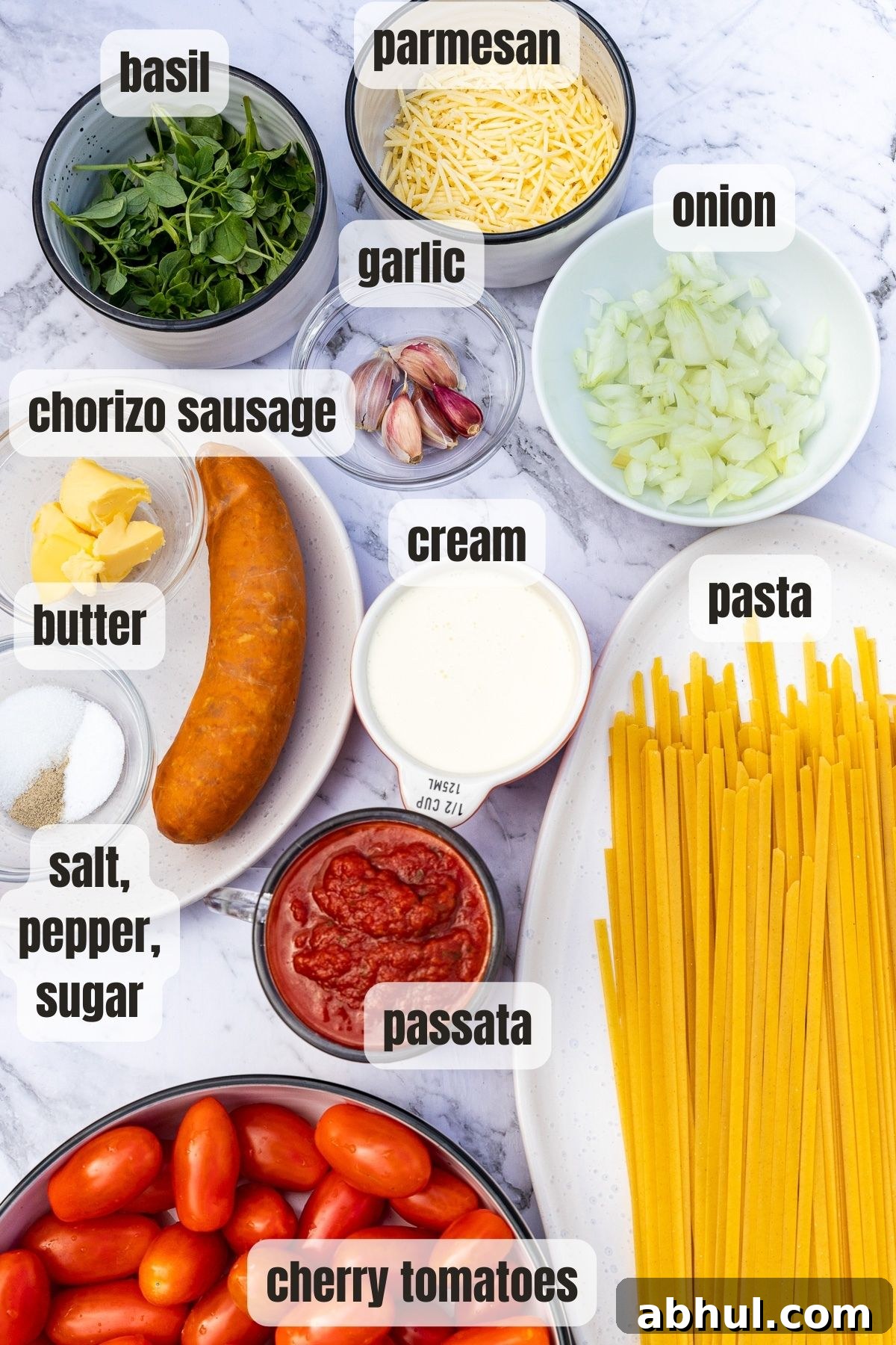 All the ingredients needed to make it on a marble background and labelled.