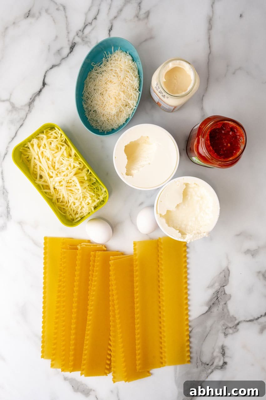 an overhead image showing the measured ingredients needed to make a lasagna with blush sauce