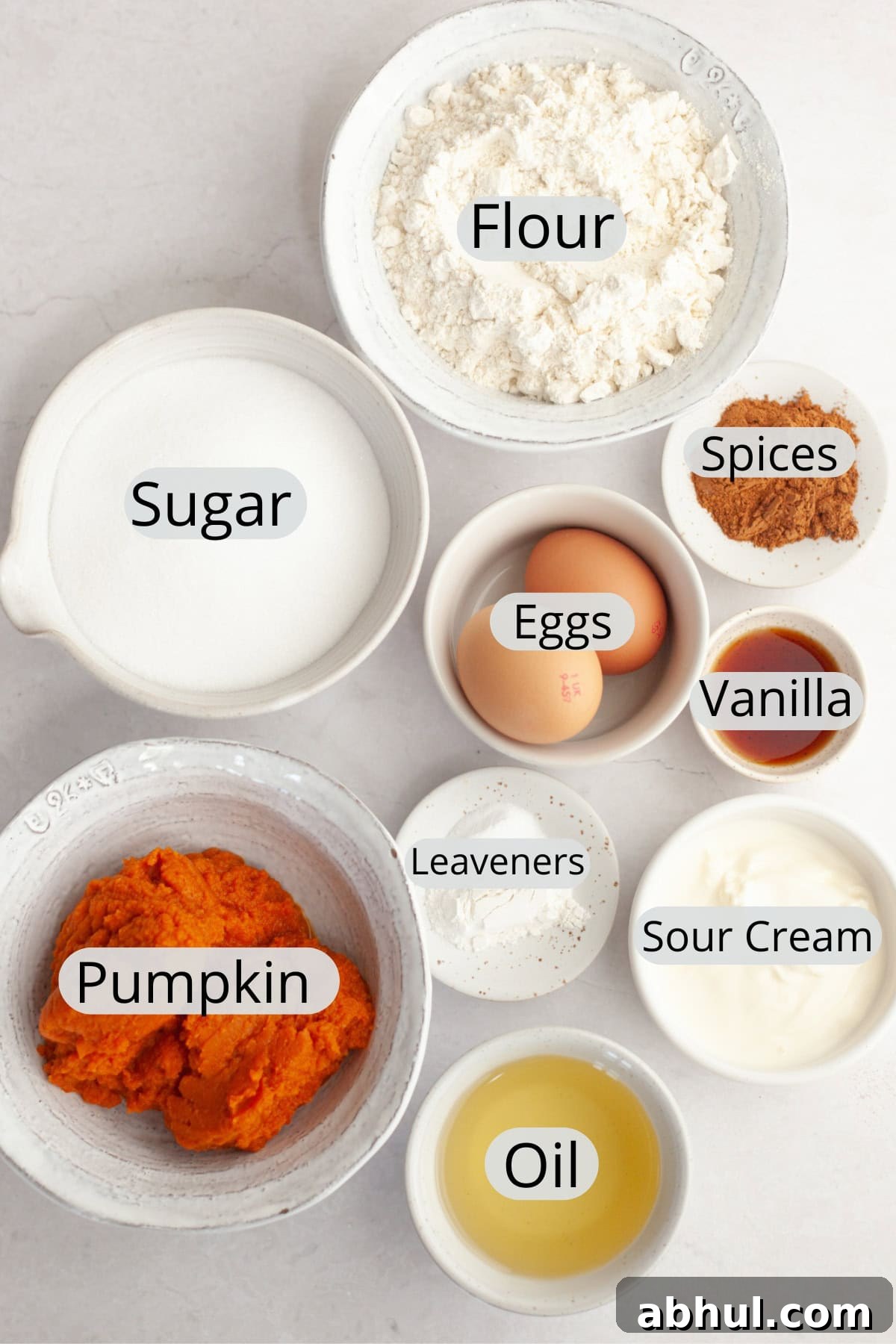 One-Bowl Pumpkin Sour Cream Muffins: Moist Fall Recipe 3 All the ingredients needed to make pumpkin sour cream muffins, weighed out into small bowls.
