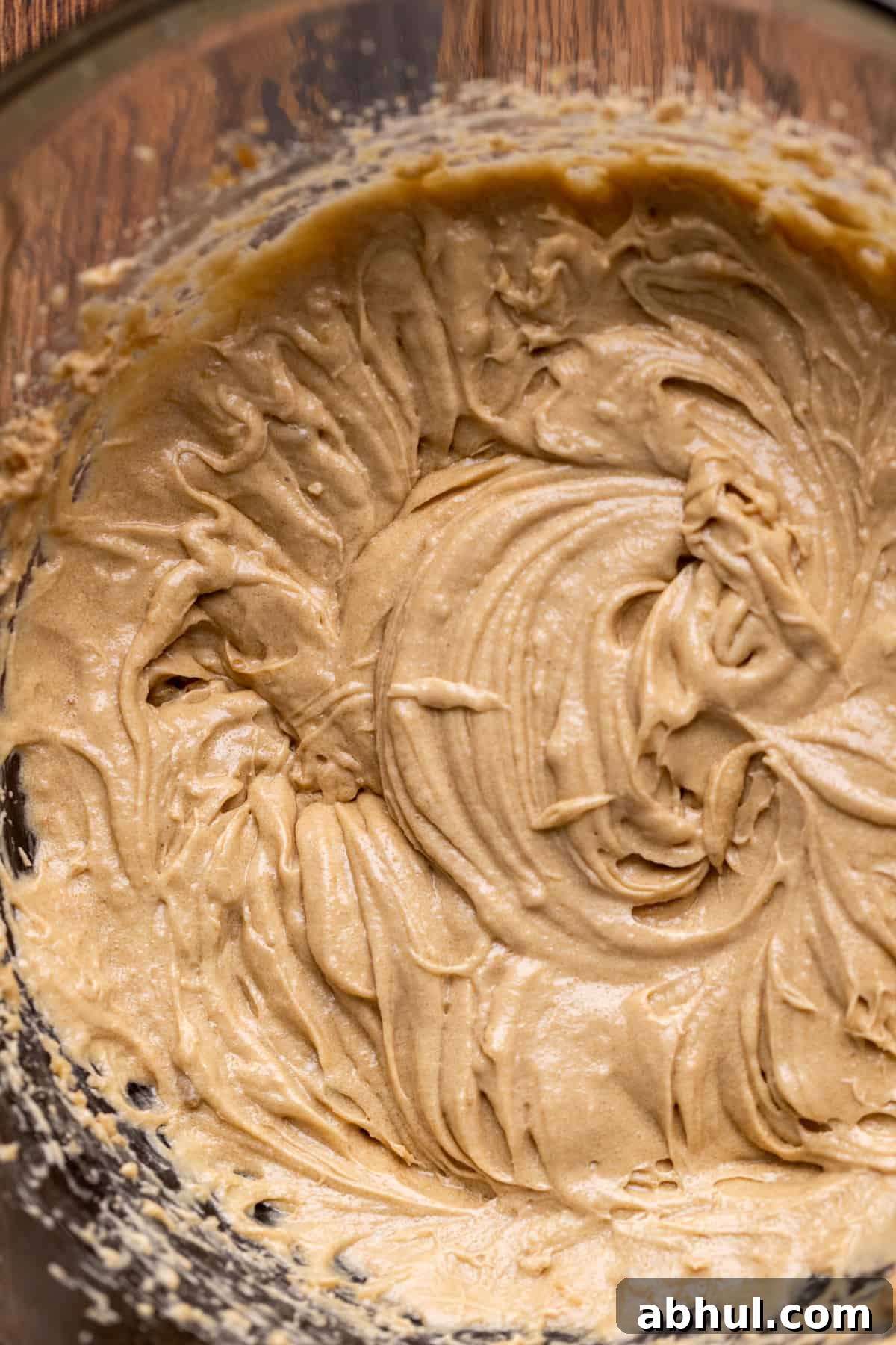 Wet ingredients in a glass bowl.