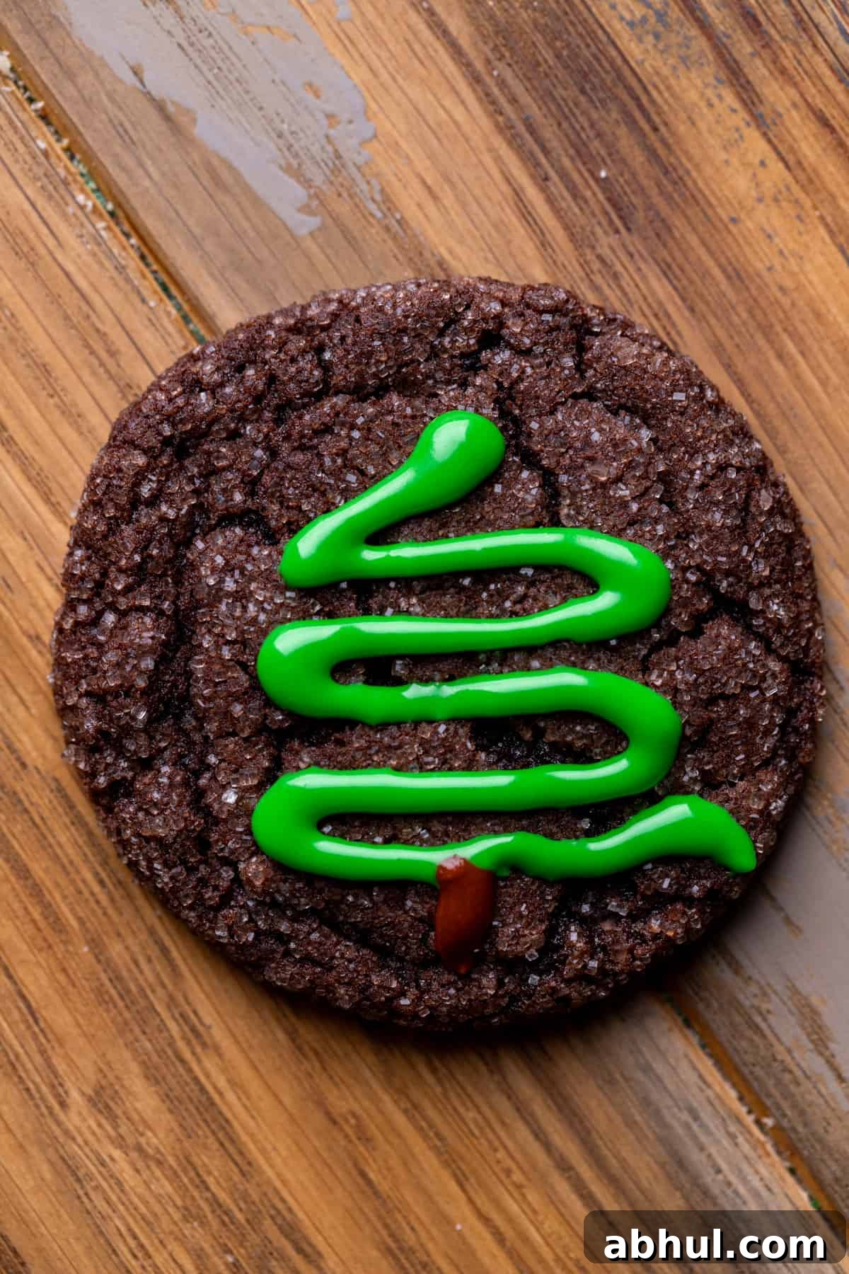 Chocolate cookie with the green icing on it.