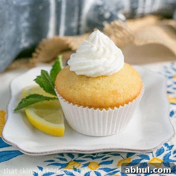 Limoncello Cupcake with Limoncello Buttercream on a square white plate.