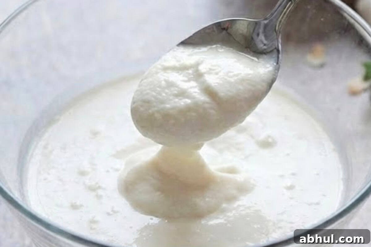 Carefully open the chilled can of coconut milk and scoop out only the thick cream from the top, leaving the liquid behind. Transfer to a mixing bowl.