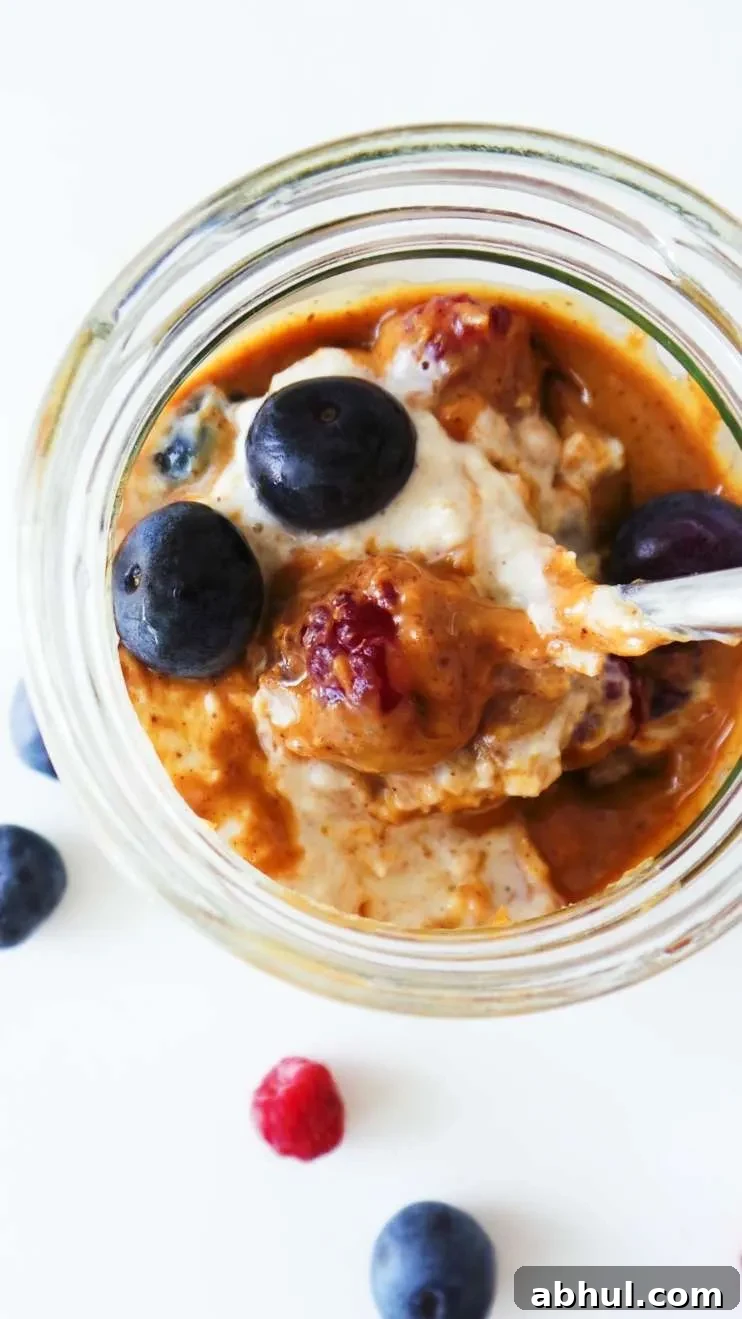 Creamy Overnight Oats With Yogurt (tasty on the go breakfast!)! This healthy and easy breakfast with peanut butter and berries tastes like a creamy dessert, but is good for your body! This 5-minute recipe is also a great meal prep breakfast idea as the oats keep in the fridge for 3-4 days.