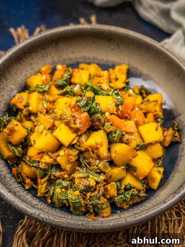 Aloo Palak Sabzi is a healthy and nutritious Indian potato and spinach stir fry. Made using simple ingredients, it comes together in under 30 minutes (vegan, gluten-free).