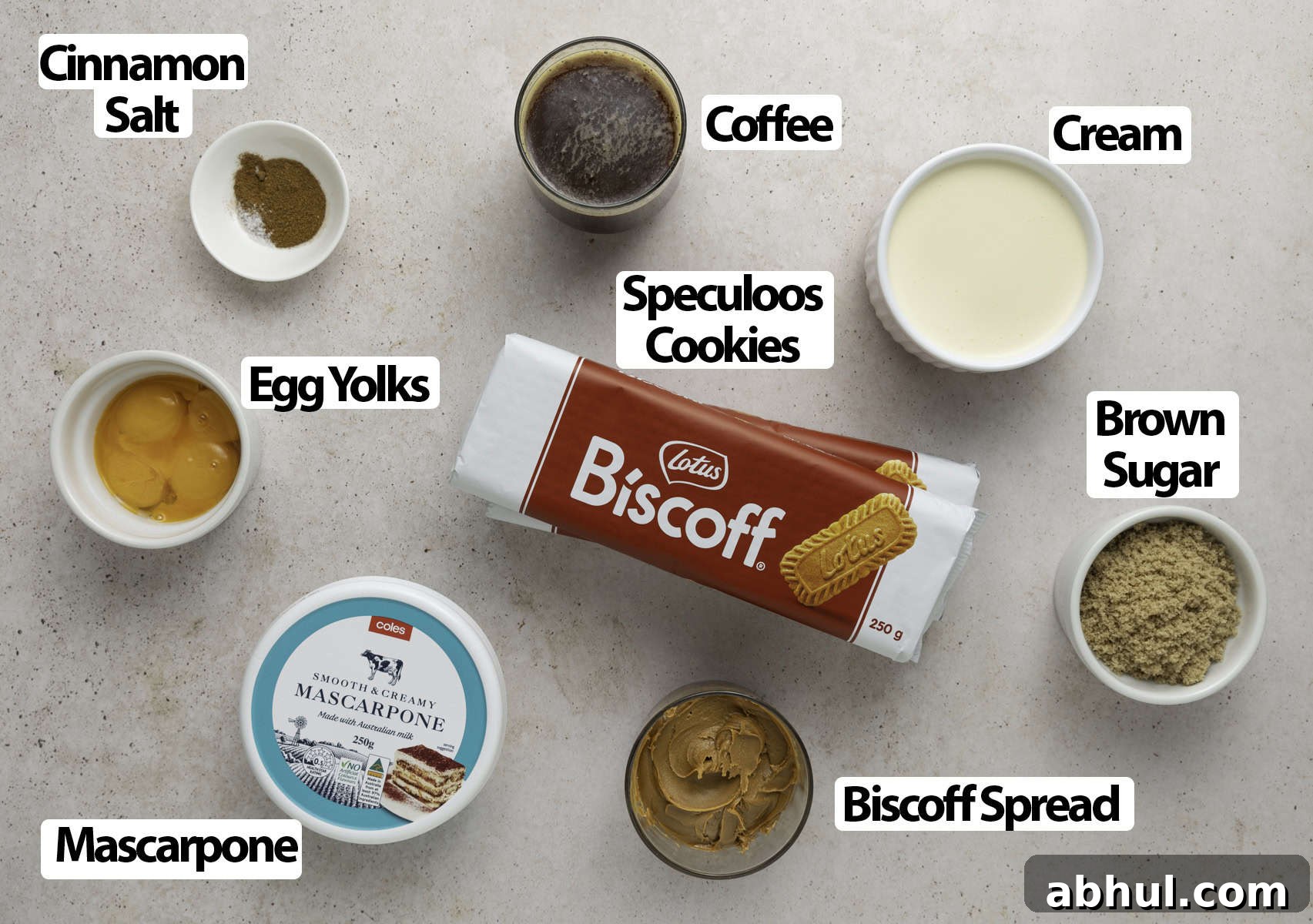 Ingredients laid on a beige surface.