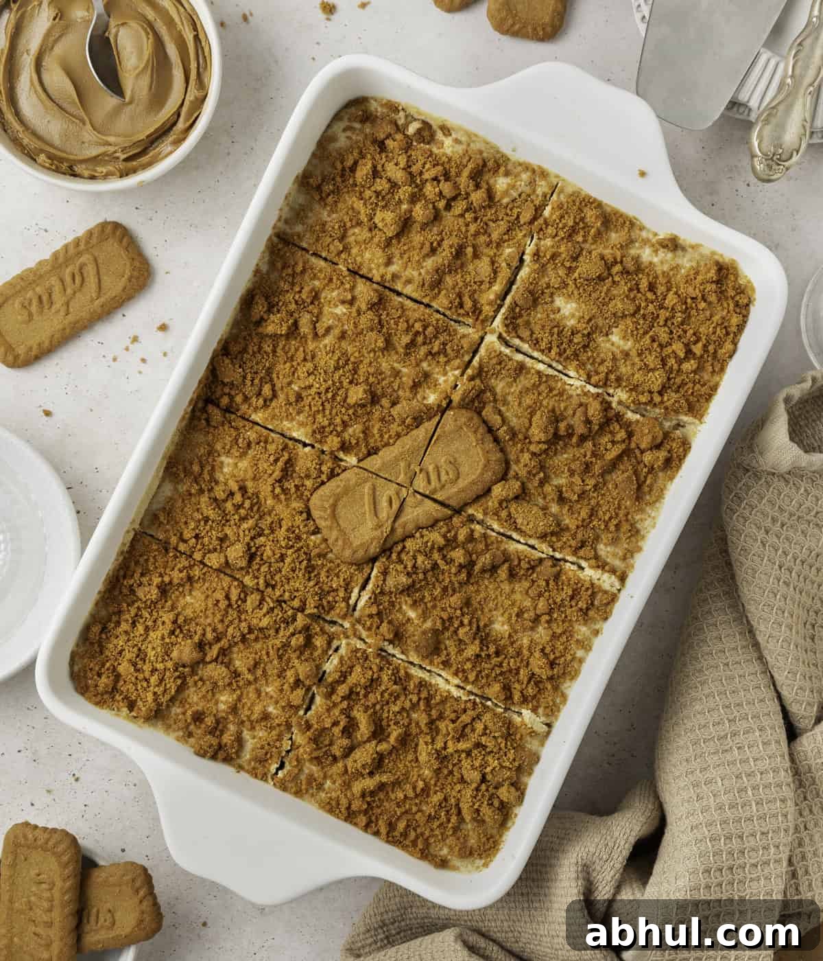 Finished tiramisu with portions cut out seen from above.