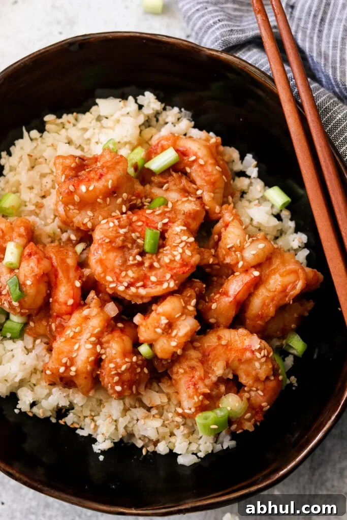 Asian Chili Garlic Shrimp in a bowl over cauliflower rice