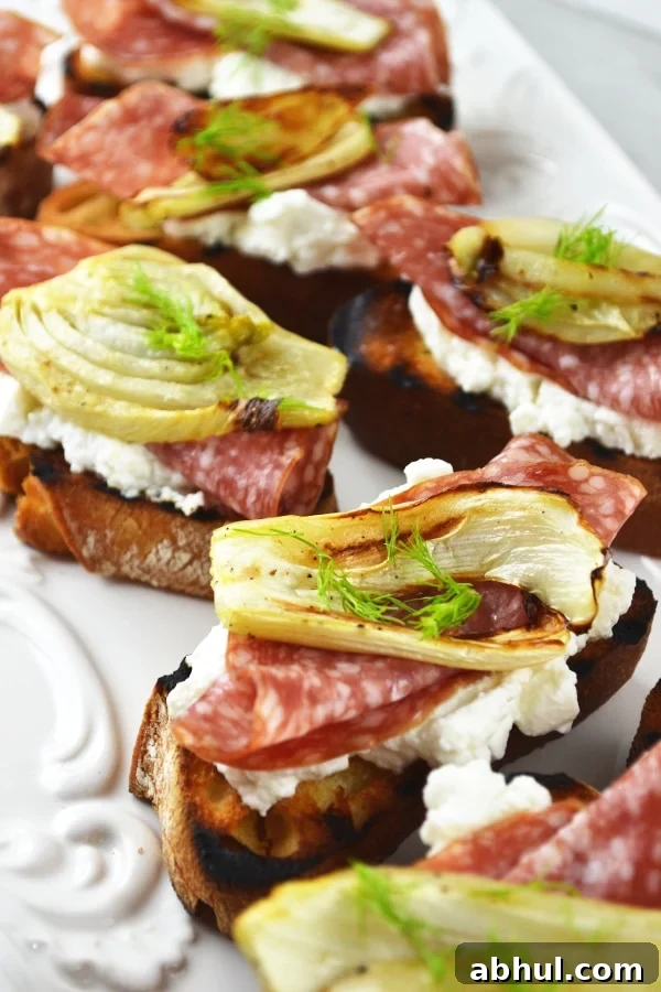 Roasted fennel, salami and ricotta crostini
